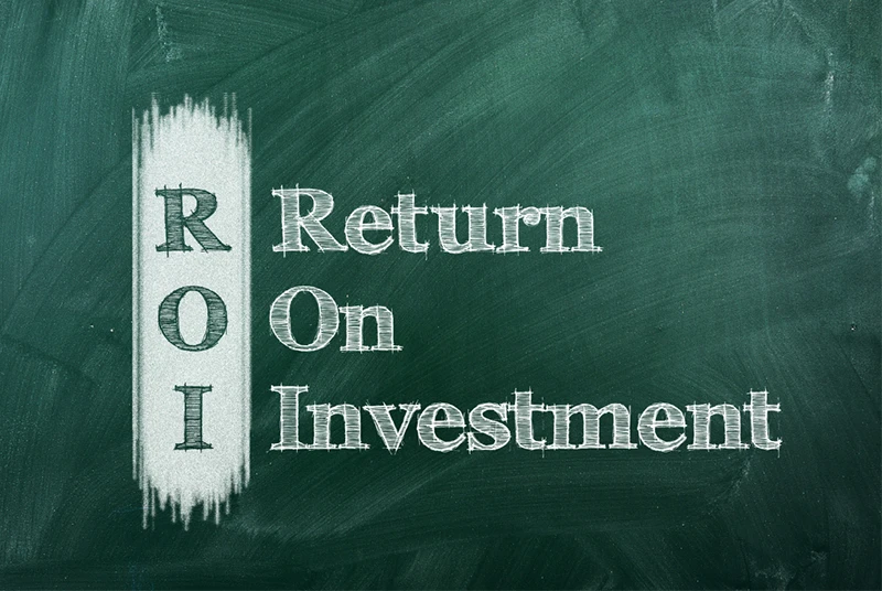 Chalkboard with ROI (return on investment) written down