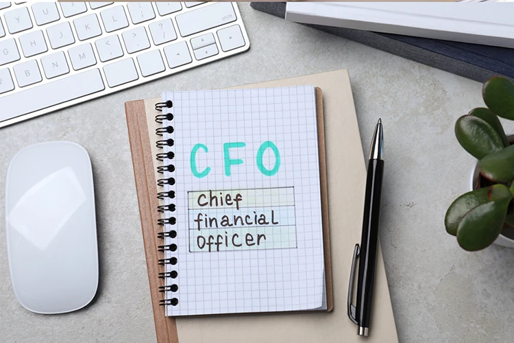 Notebook on office desk with CFO title 